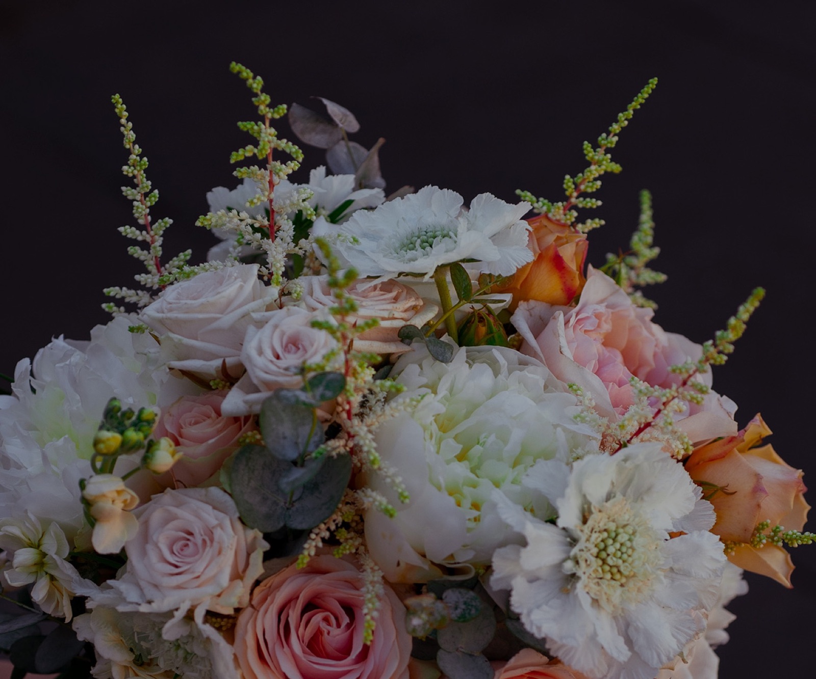 Presentation bouquet of garden roses, peonies and astilbe